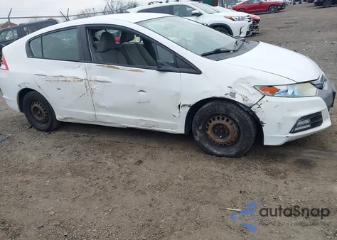 2012 Honda Insight z USA, uszkodzony, nr VIN JHMZE2H3XCS000193